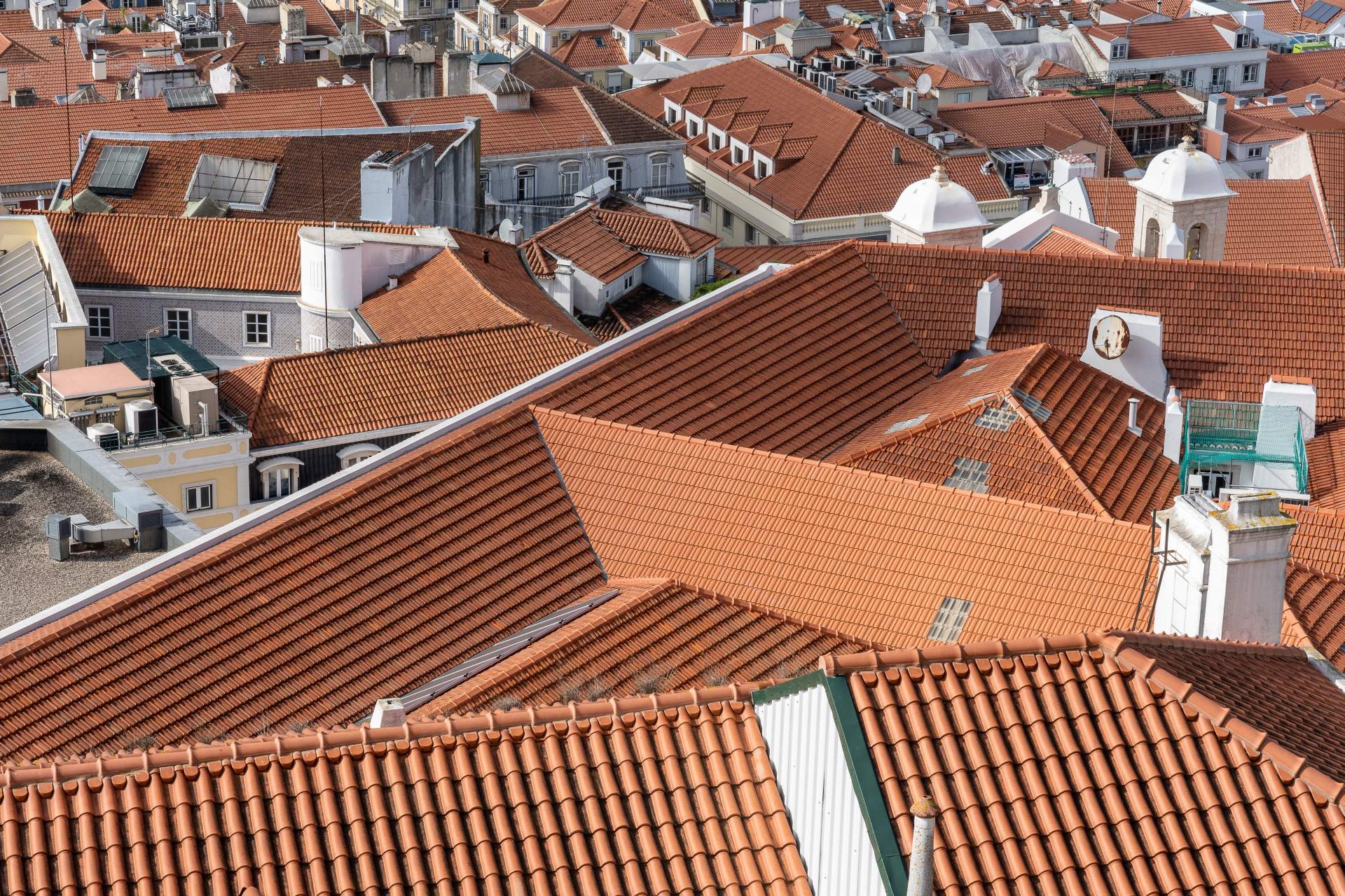 aerial-shot-rooftops-city-buildings-with-red-shingles (1)